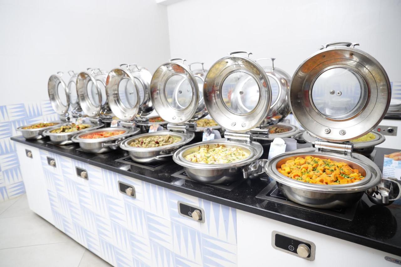 The Mirage Resort & Spa Al-Hammamat Zewnętrze zdjęcie A chafing dish buffet